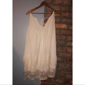 ina flowing white dress, size S
